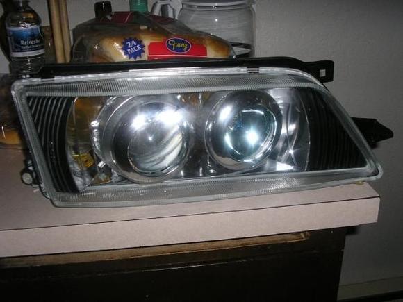 stock a32 headlights dual lens retrofit