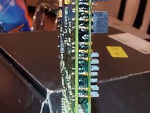 I used wire cutters to cut the studs to split the 2 boards apart. Here they have been soldered back together. I just soldered the seam that I cut. 