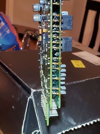 I used wire cutters to cut the studs to split the 2 boards apart. Here they have been soldered back together. I just soldered the seam that I cut. 