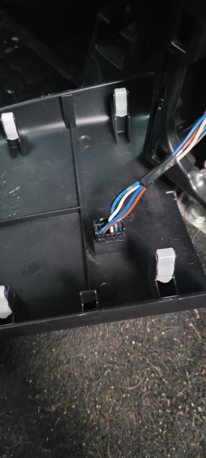 Center console panel interior. But it's blank on the other side. 