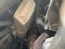 Metal plate on fan rubbing against engine preventing from coming out. 