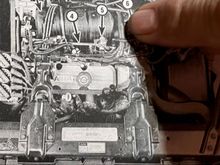 Where the wiring harness rubbed a hole in the intake manifold. 