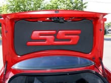 Trunk lid liner with custom painted lettering