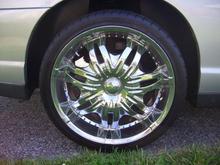Pacer Mystique rims and Nitro xtreme 555(i believe)..20's.
