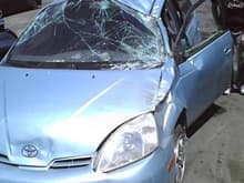 My cousins Prius after she rolled it...Yikes! Glad she was ok.