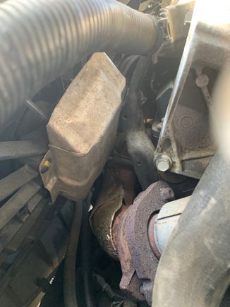 Metal plate on fan rubbing against engine preventing from coming out. 