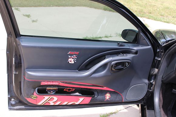 Both door panels have been refurbished and customized.