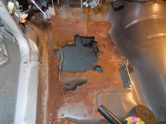 A little hole in the floor only thing keeping my feet in the car was carpet and transmission brace