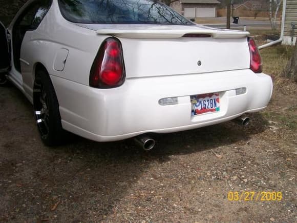 Cleaned up the trunk... took off all the badges and then got some new exhaust tips