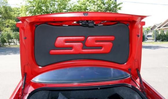 Trunk lid liner with custom painted lettering