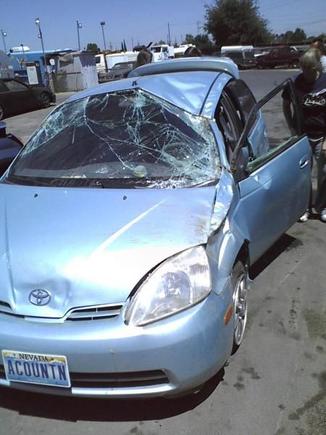 My cousins Prius after she rolled it...Yikes! Glad she was ok.