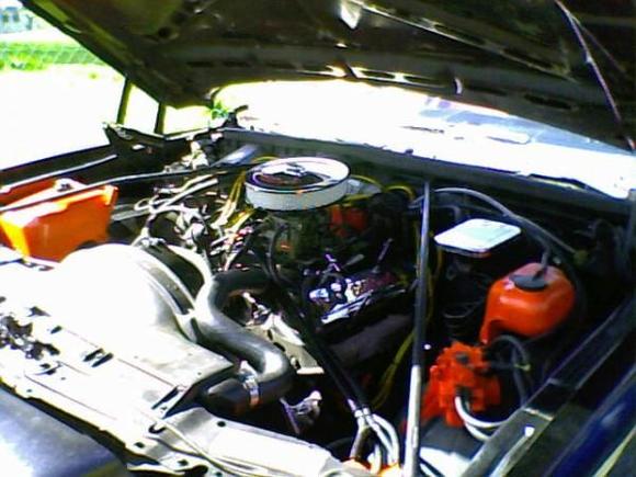 I sometimes Paint for a living and so during the warm months I will let that carry over into my car. I have added some Chevorlet orange under her hood.