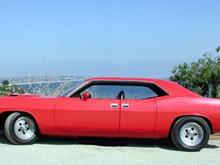 Cuda 4

Thanks to Photoshop I was able to see what my Cuda might look like as a 4 door!