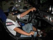 My ten year old grandsone in training. I took him to the Sonoma Raceway Nationals He was hooked.
