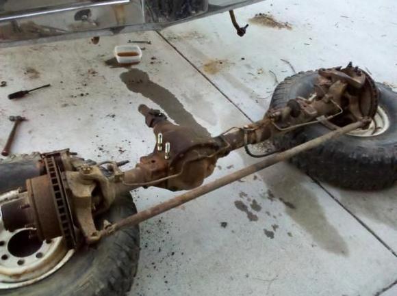 Shouldn't have to pull the axle to put in a lift... but when its this old and rusty... never know what you are going to run into