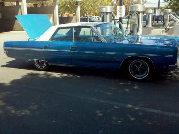 Abigail   Pass side at car wash 

At the car wash after having the wheels installed.