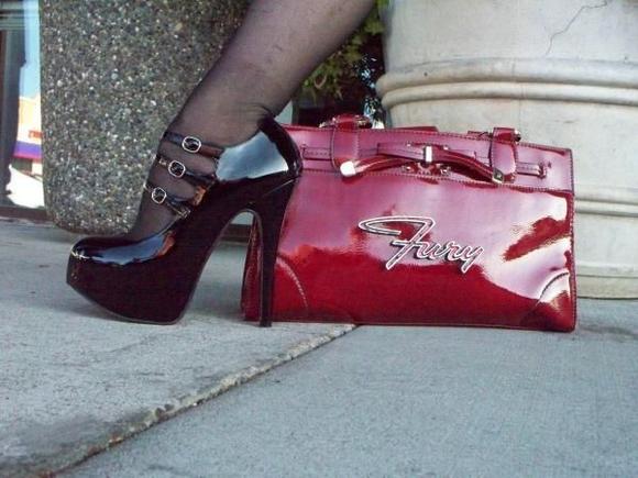 Yeah that's a real Fury logo, and yes, I can walk in these shoes.