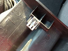 The plastic covers on the rear of the seat tracks are held on by these clips