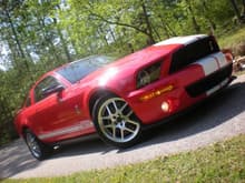 2009 Shelby GT500
HID's
ambient lighting
touchscreen navigation
red interior accent package
bone stock
477rwhp
470rwtq
12.0 w slicks

http://www.facebook.com/#!/Sanchez500