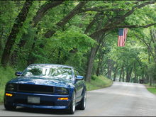 River Road Cruise w/ American Flag Backdrop