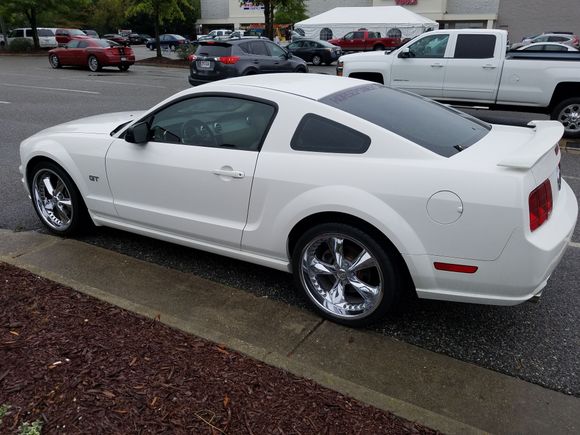 Before, with chrome rims and spoiler