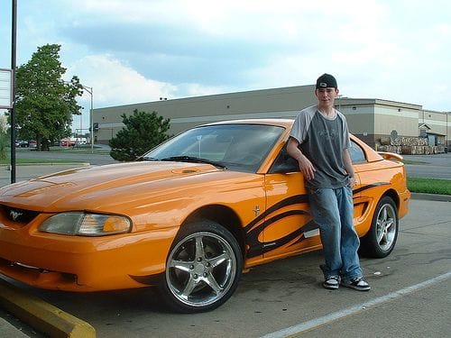 My Son with his 1st Mustang..yeah he ran the piss outta that car