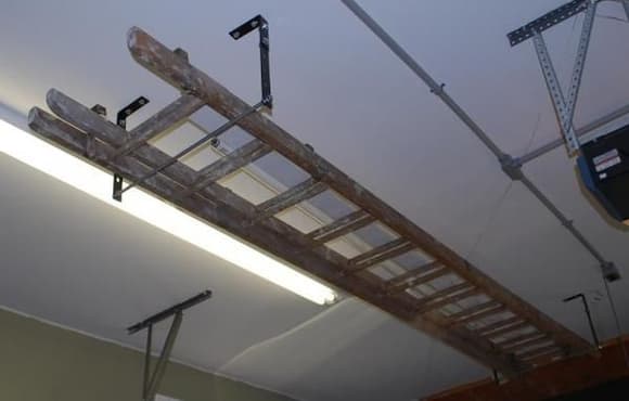 Homemade rack for storing ladder