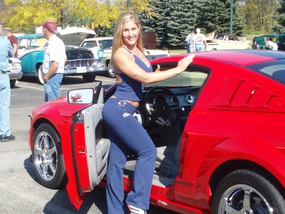 My Mustang and a Fitness Model at a local car show in New Albany, OH. Girls love Stangs!