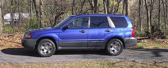 Wife's 2003 Forester X 2.5 .... 5spd, purchased May 2007 with some damage which I fixed, not structural, just a fender and hood.   Had 51K miles on her then, in high 90s now in 2013 ..... gotta change t-belts come spring.