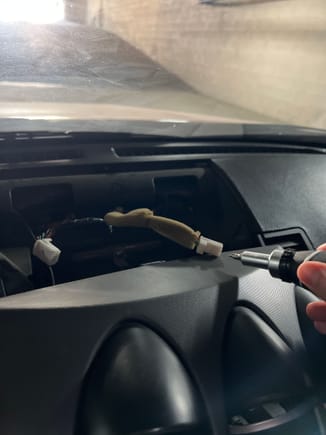 Pointing at the connector that kills my nav screen.