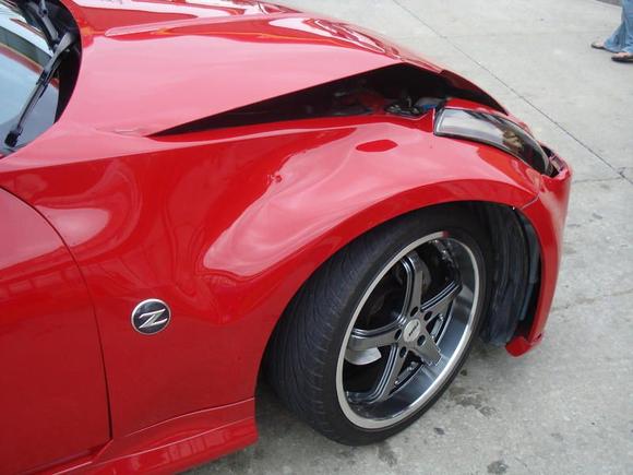 crinkled hood and rippled fender