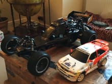 Just got this one, it is 1/5 scale and will have a Kraken body conversion this week, it has not been run yet but is very modified and has about 7 hp 32 cc engine.  I picked up another one which is 29cc and race prepped with over £2k worth of mods and I paid a really keen price for the pair as the eBay auctions ended and I went to see him face to face and waved some notes under his nose...I got a Range Rover boot full of spares including engines etc.