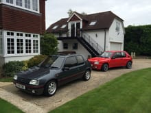 Here it is sharing the driveway with my Steel Grey 205 gti, one of 300 made in that colour and I have just had a full repaint, this car is pretty much as it left the factory apart from the gti6 2.0 16v engine and brakes.