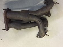 Today I replaced the whole exhaust system and deleted the 3 cats which are very restrictive. First off is an early 156 cf2 exhaust manifold.