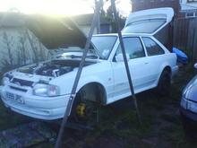 Car with gantry set up still, no need for that now as g/box and engine is back in!! Looks mint with steels on dont it :|!! Polished cosworth wheels going on sometime next month!!