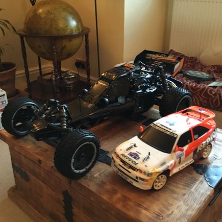 Just got this one, it is 1/5 scale and will have a Kraken body conversion this week, it has not been run yet but is very modified and has about 7 hp 32 cc engine.  I picked up another one which is 29cc and race prepped with over £2k worth of mods and I paid a really keen price for the pair as the eBay auctions ended and I went to see him face to face and waved some notes under his nose...I got a Range Rover boot full of spares including engines etc.