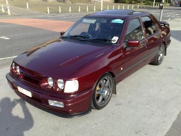 Engine:Stage 3 conversion,200 motorsport block,ported head &amp; inlet plenum,RS500 intercooler,T34 turbo,3"straight through stainless stell exhaust,K&amp;N air filter,803 dark green injectors,044 Group A fuel pump,3 bar map sensor,-34 actuator,blitz sbc-3 boost controller,L8 4x4 ECU with M.S.D MAP with Launch Control &amp; Anti-Lag running 350BHP@25psi?335ftlb,0-60=4.9 &amp; 165 mph top end,standing 1/4 mile 13.1@107.2mph.
Gearbox:Standard.
Diff:7.5" Quaife ATB LSD.
Suspension:Koni sport shocks,Avo uprated springs,Poly bushed all round.
Brakes:Front,330mm disks with big Porsche 911 Turbo 4 pot calipers,Rear,4x4 vented 283mm.
Wheels:Compomotive MO's 17" 215/40/17 Yokohama Parada.
Body:Ford motorsport quad headlights,RS500 front spliter.
Interior:Full leather,various gauges dials etc