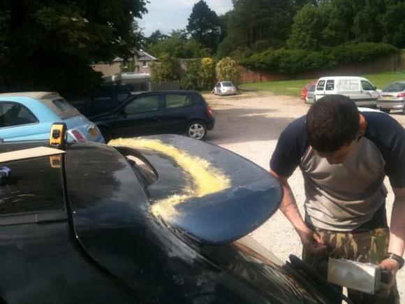 Seen an image on here of a custom spoiler that someone had fabricated from a Citroen vtr spoiler on top of a standard fiesta zetec-S spoiler so I thought, why the hell not.... (not me in the photo)