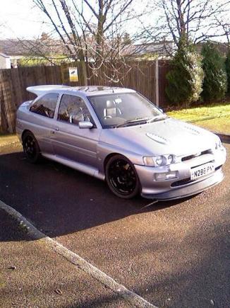 at this stage, gaz coil overs are on, strut brace, pro alloy rad, air sep, breather system, strut brace, sicone hoses and changed the colour of the wheels and the plate, there will be more to come.