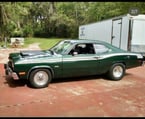 1974 Plymouth duster and a 1981 Chrysler Lebaron 