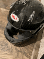 Brand New Bell M.8 Carbon 57 SA2020 helmet in black.