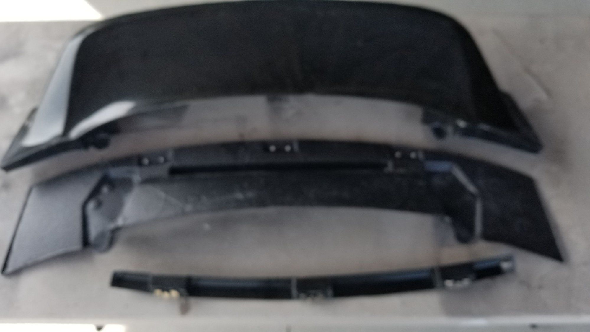 Top and middle piece will be bonded together.  Bottom piece fits in channel at rear base of wing assembly and held with existing screws