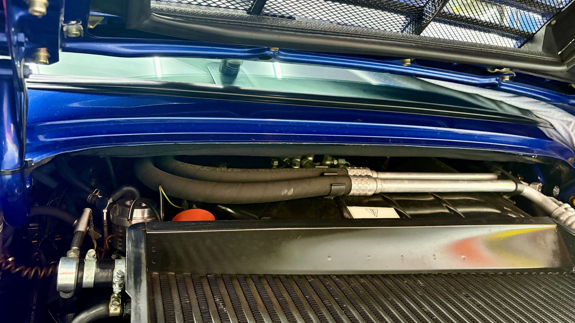 Clean line along the area just above the sound deadening pad. 