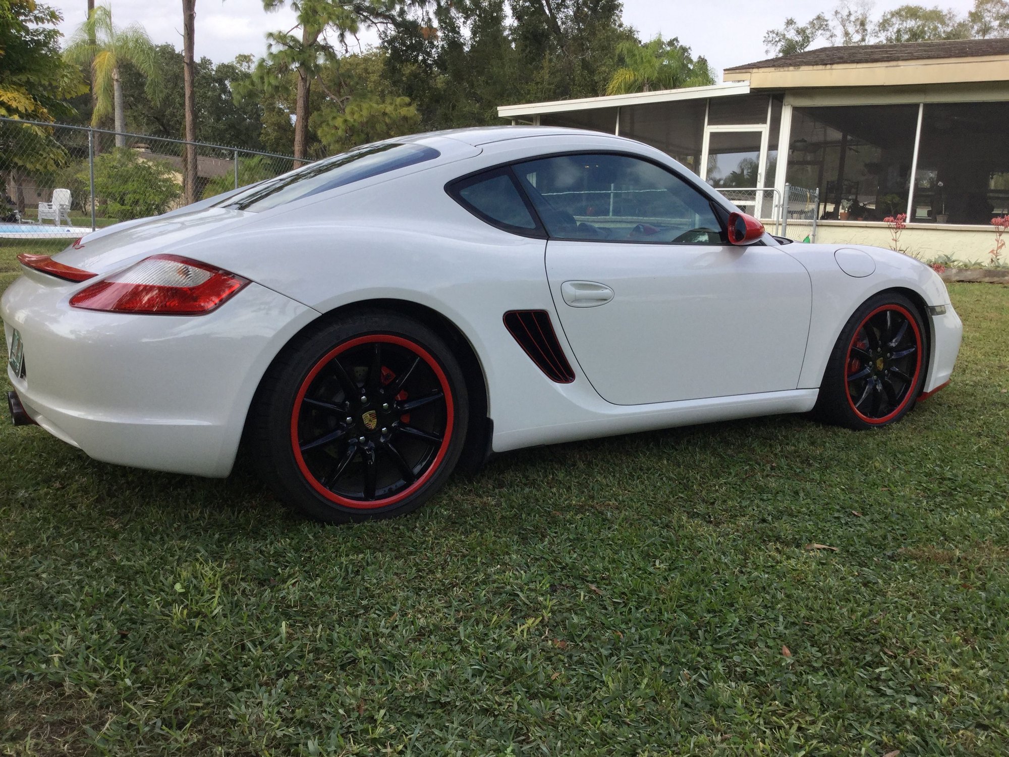 2006 Porsche Cayman - 2006 Cayman S white with red and black accents - Used - VIN WP0AB29846U782890 - 104,322 Miles - 6 cyl - 2WD - Manual - Coupe - White - Tampa, FL 33624, United States