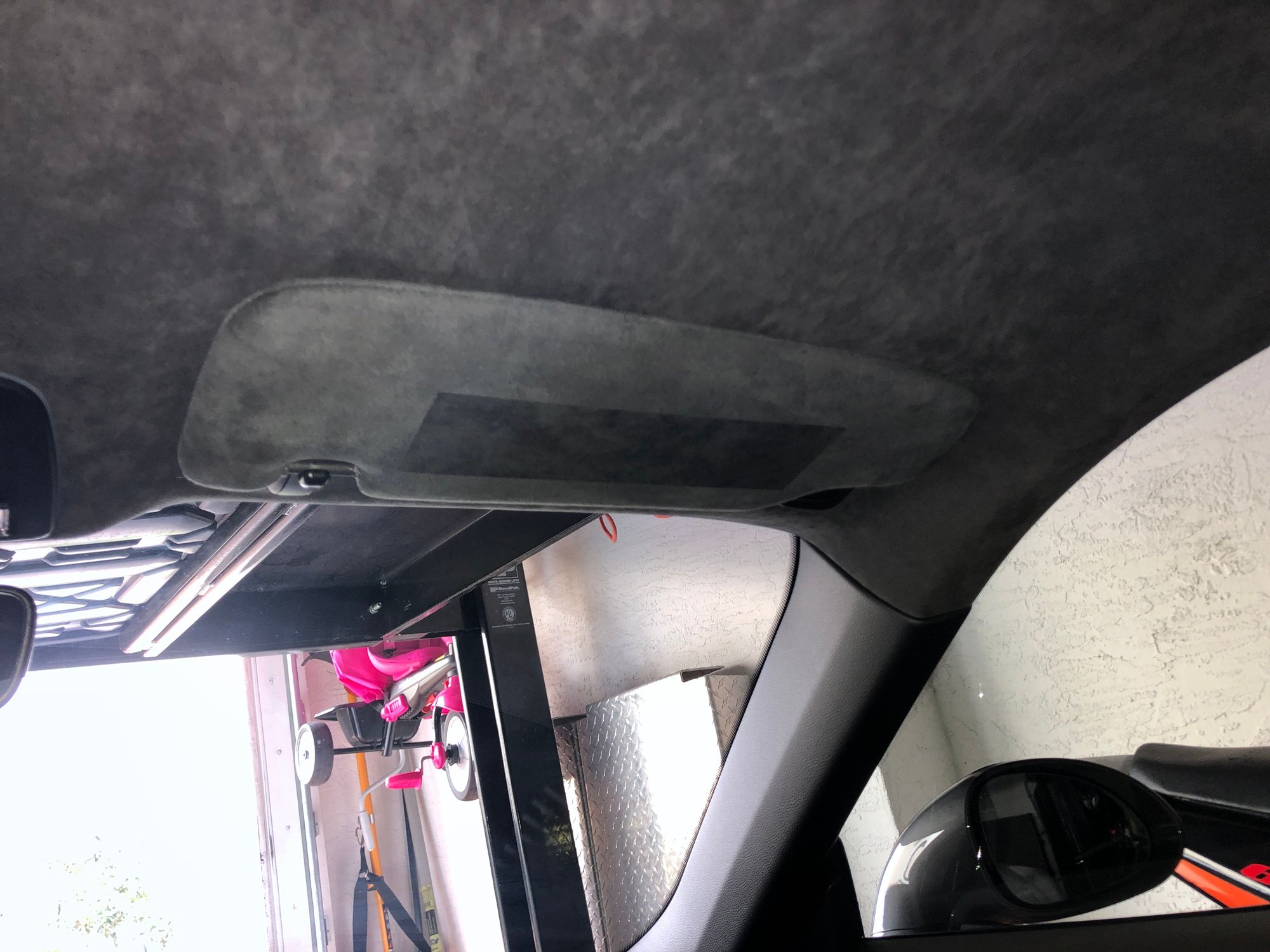 DIY Removing airbag warning stickers from Alcantara sun visors