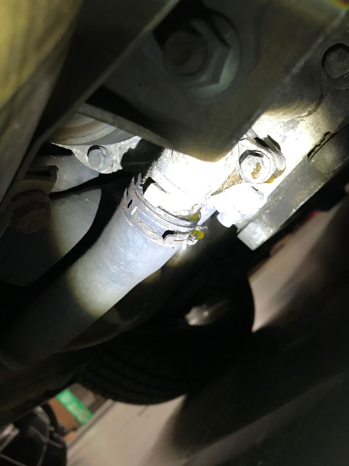 Clearorange fluid leak at rear left of engine compartment