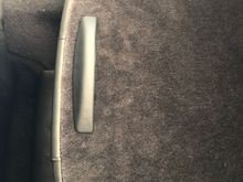 Luggage stopper on back of rear seat