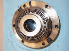 Backside of pinion gear/bearing assembly, showing one of the tapered roller bearings.