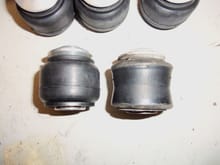 New barrel shaped bushing on the left, old tapered bushing on the right.