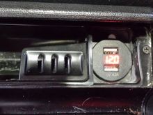 2 USB slots , and digital Voltage reading, in place of lighter.